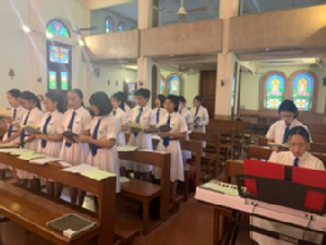 The Assembly Choir sings in Monthly Mass.